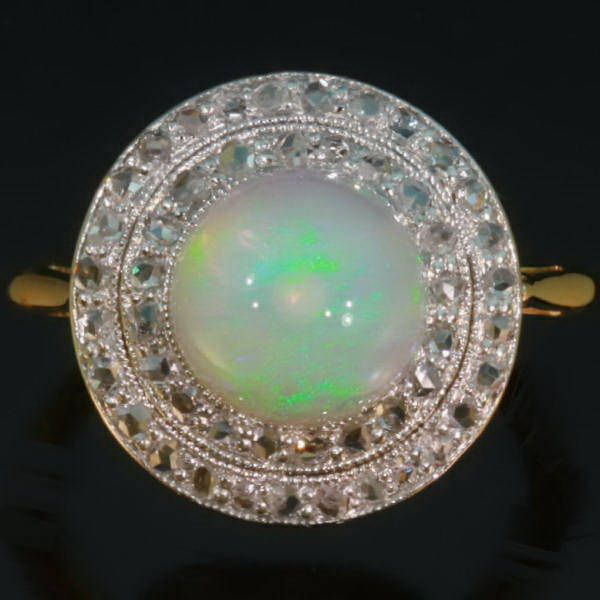 Late Victorian engagement ring with rose cut diamonds and button polished opal